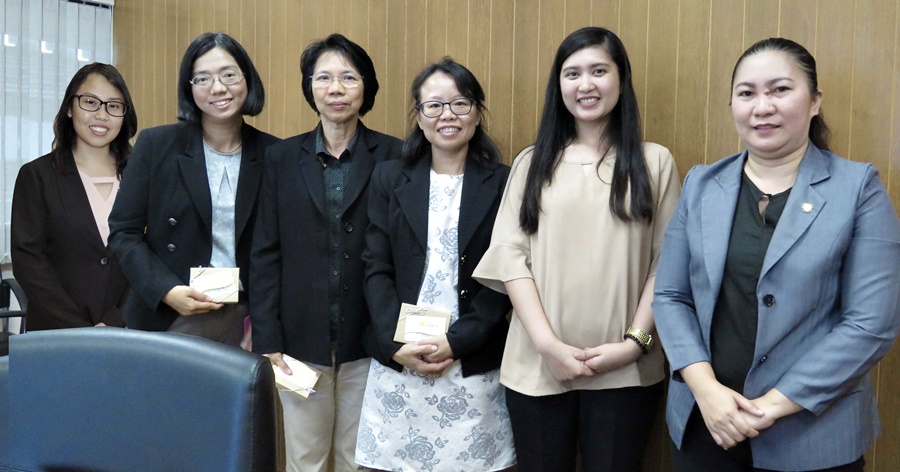 Key personnel from SEAMEO Secretariat's Finance Division led by Ms. Kornkanok Chureeganon (center), Finance Manager, posed for a photo with delegates from SEARCA.