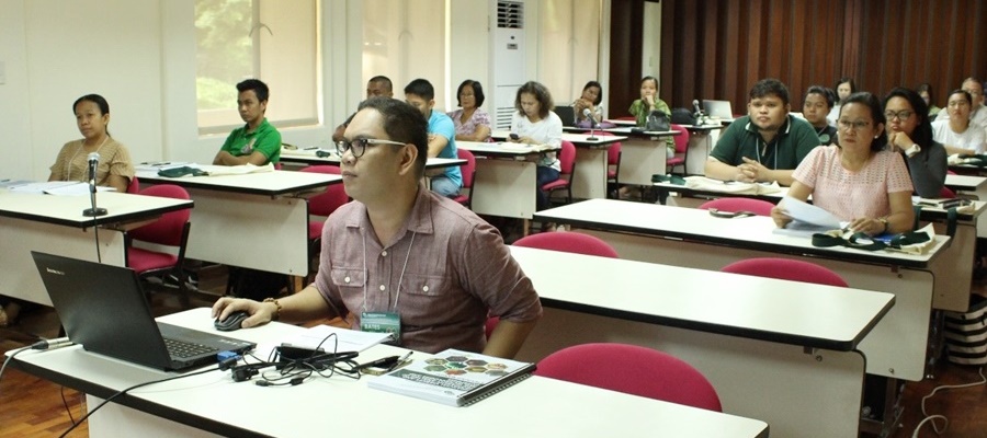 Training participants attentively listening to the lecture of Dr. Corazon T. Aragon (not in photo), Project Leader, on Cost and Return Analysis.